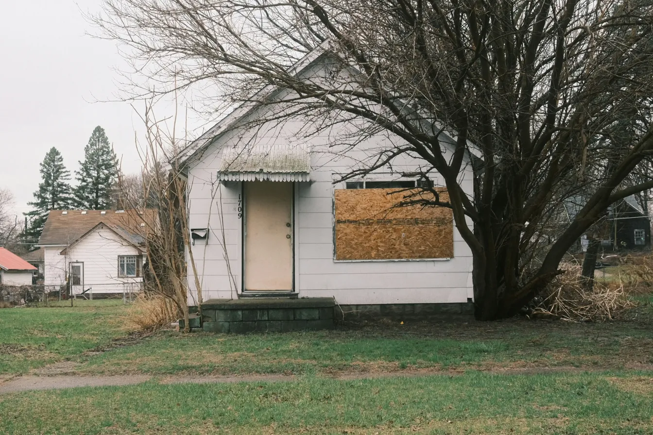 Boarded-up foreclosed home in Illinois, a common outcome when homeowners do not act early