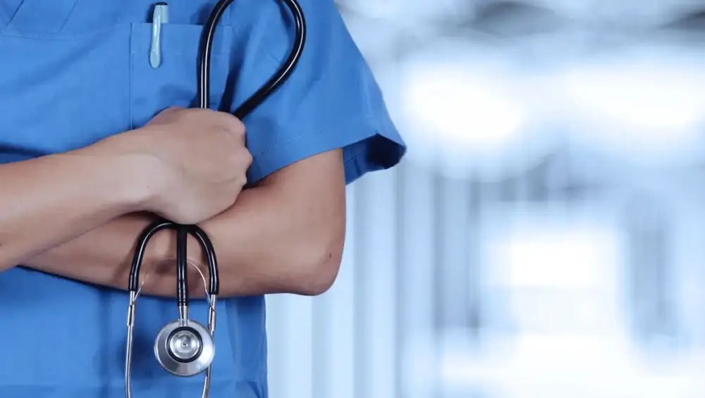 A nurse holding a stethoscope