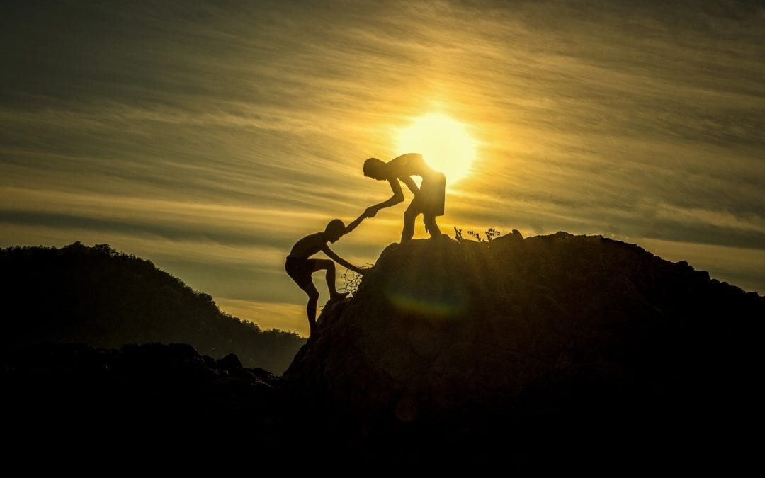 two people climbing a mountain hand in hand for short sale rescue illustration