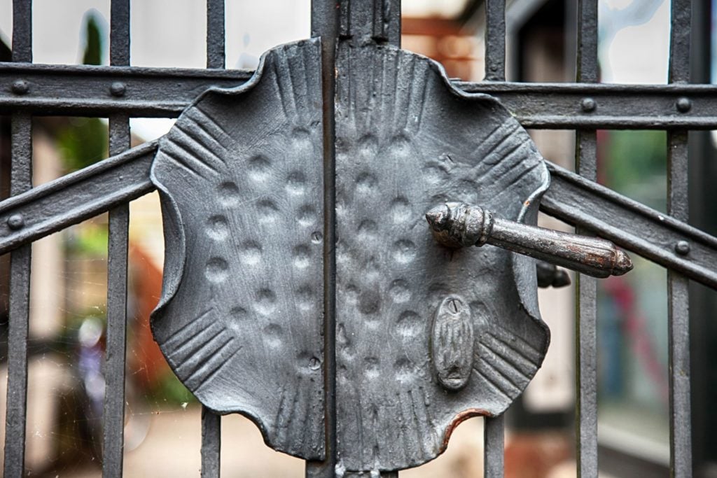 closed iron gate to show how foreclosure ends property possession