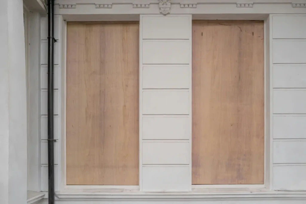 how to evict squatters in chicago, boarded up windows for image